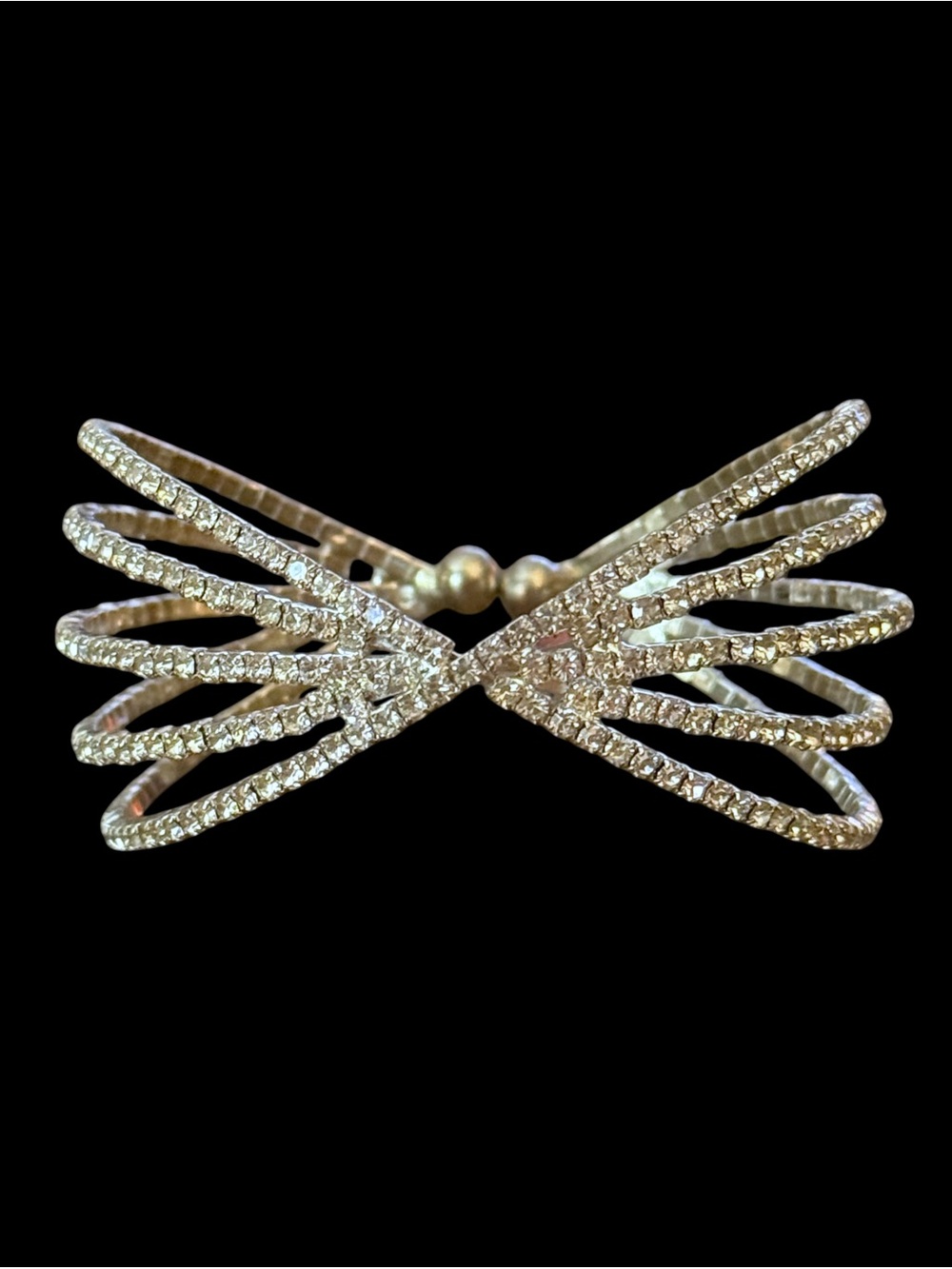 Sparkling silver tone rhinestone cross cross wire cuff bracelet